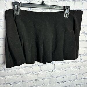 Black pleated mini skirt